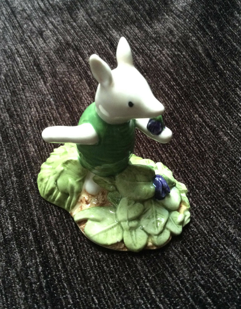 Royal Doulton Winnie The Pooh figurine Royal Doulton Piglet figurine Royal Doulton Picking violets figurine WP13