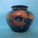 A Moorcroft Vase c1918-1926 in the Pomegranate Design by William Moorcroft