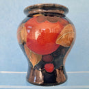 A Moorcroft Vase in the Pomegranate Design by William Moorcroft