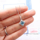 18ct White Gold Blue Topaz & Diamond Pendant