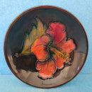 A Moorcroft Flambé Footed Bowl. Early Hibiscus Design by Walter Moorcroft.