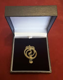 A Celtic Bronze ,Openwork Spiral War Trumpet Cloak Brooch.