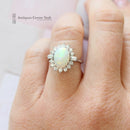 18ct White Gold Opal & Diamond Oval Cluster Ring