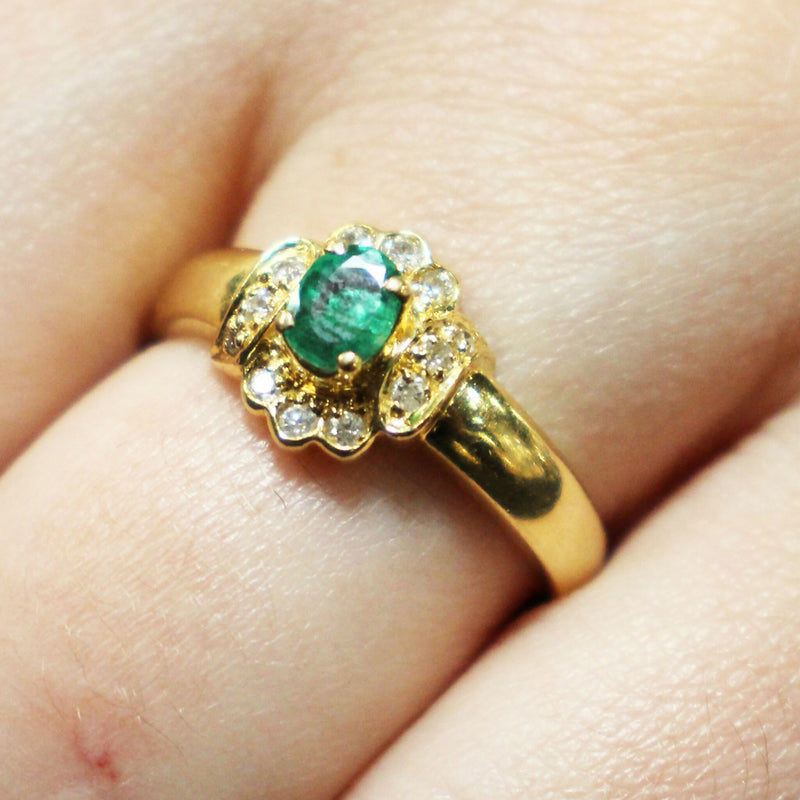 18ct emerald and diamond cluster ring