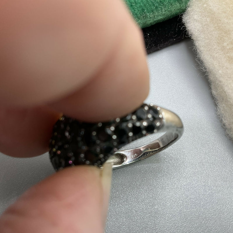 Silver and black spinel ring