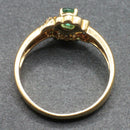 18ct emerald and diamond cluster ring