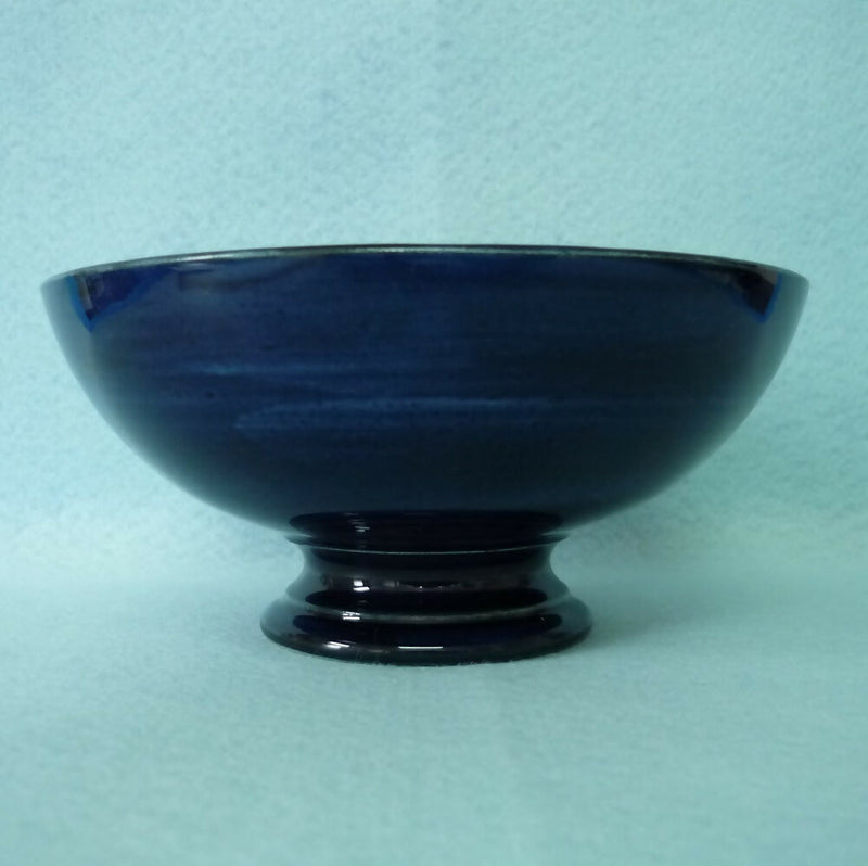 A Moorcroft Footed Bowl (Dia 5.47inch) in the Orchid Pattern by Walter Moorcroft