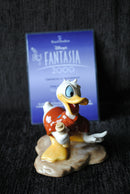 Royal Doulton Donald Duck figurine Royal Doulton Fantasia figurine Royal Doulton Noah’s Helper figure