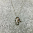 Silver and CZ dolphin pendant