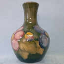 A Moorcroft Vase in the Clematis Design by Walter Moorcroft