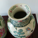 A pair of Japanese pottery vases.