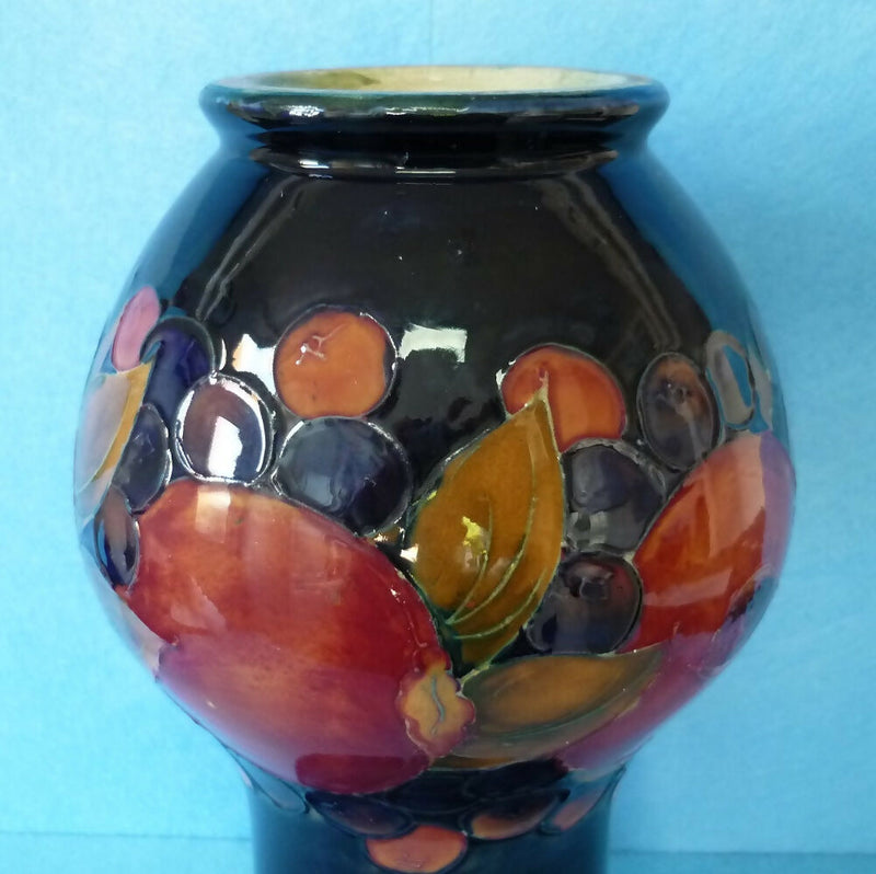 Moorcroft Vase (9.84 inch). Pomegranate Design by William Moorcroft.