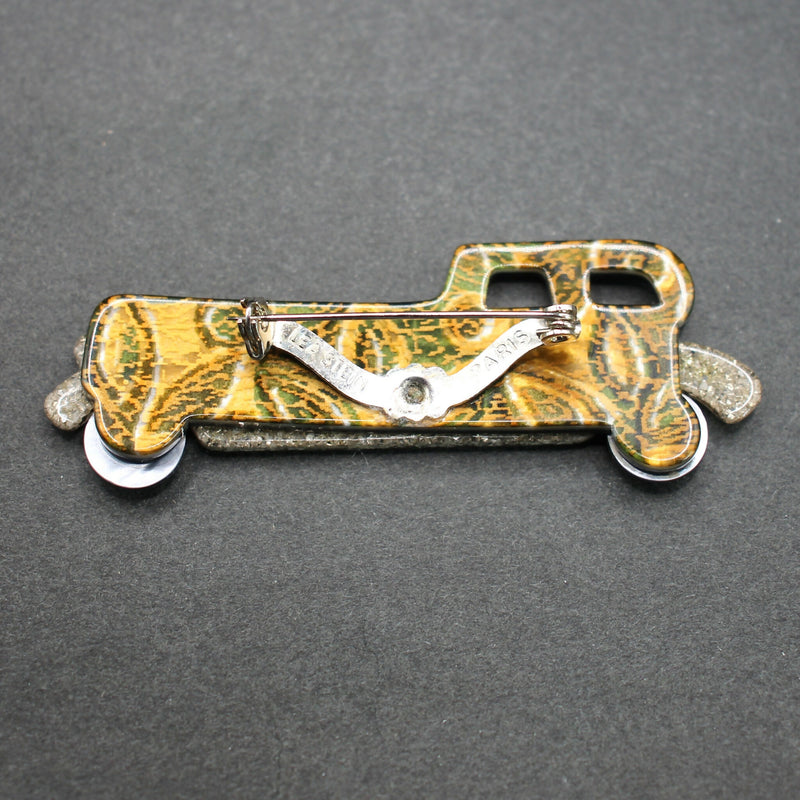Lea Stein black-gold limousine brooch