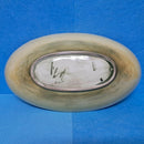 A Moorcroft Oval Bowl in the Hibiscus Design by Walter Moorcroft