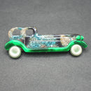 Lea Stein green-blue-silver limousine brooch