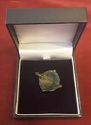 A Roman Umbanate Enamelled Cloak Brooch.