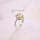 Platinum Yellow Sapphire & Diamond Oval Cluster Ring