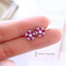 18ct White Gold Ruby & Diamond Cluster Earrings by Luke Stockley London