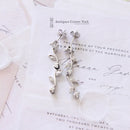 White Gold Diamond Petal Drop Earrings