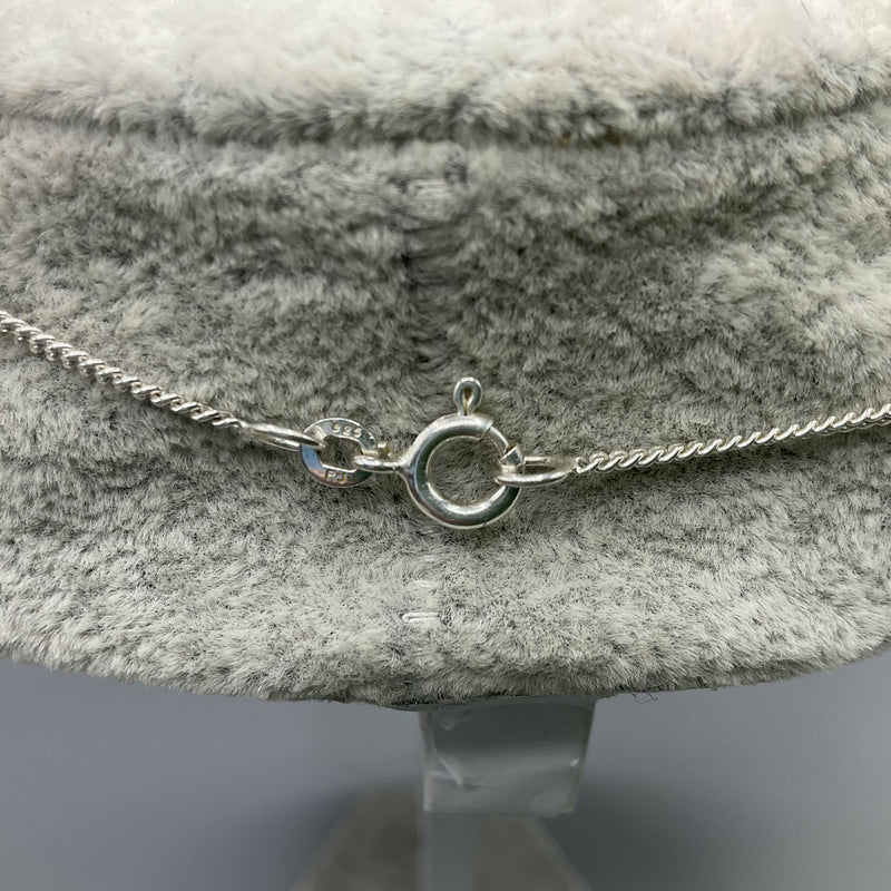 Silver and red amber pendant