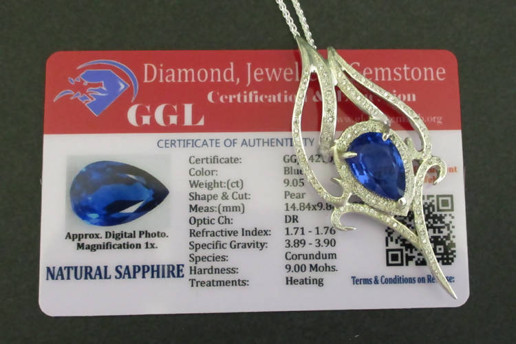 Jake: Sapphire and zirconias silver pendant