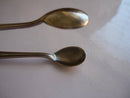 A Pair of Art Deco Style Silver Plate Sugar Tongues in the Pyramid Pattern