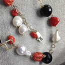 Silver gilt, red coral and baroque pearl necklace