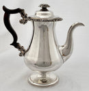 Late Georgian Sheffield plated pedestal coffee pot with foliate decoration. Circa 1825.