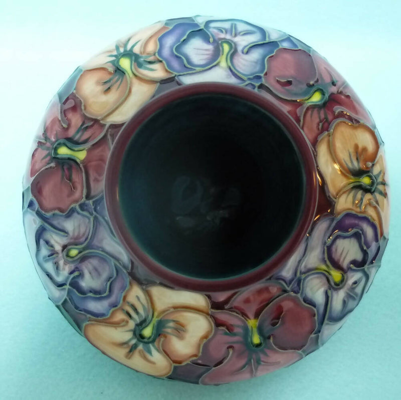 A Moorcroft Squat Vase (Dia 5.23") in the Pansy Design by Rachel Bishop