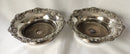 Victorian pair of silver plated bottle coasters with applied rims of trailing vines.