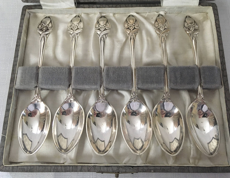 Cased set of six silver plated Art Nouveau teaspoons.