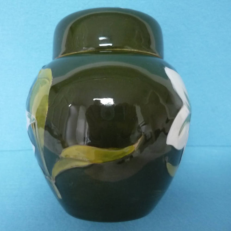 A Moorcroft Ginger Jar in the Bermuda Lily Pattern