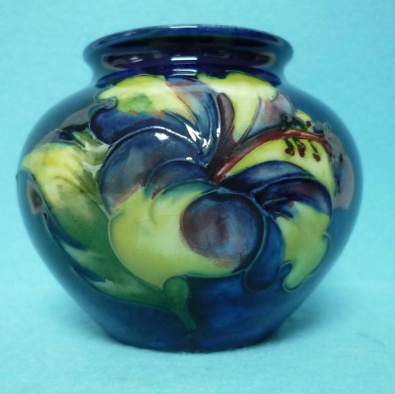 A Moorcroft Small Vase in the Hibiscus Pattern by Walter Moorcroft