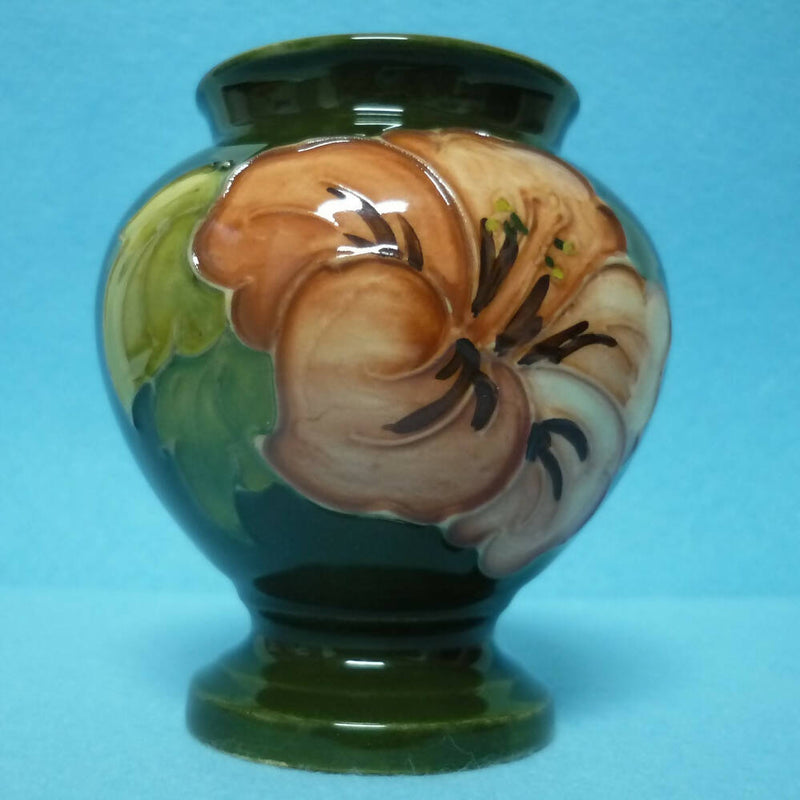 A Moorcroft Baluster Shaped Vase in the Hibiscus Pattern by Walter Moorcroft