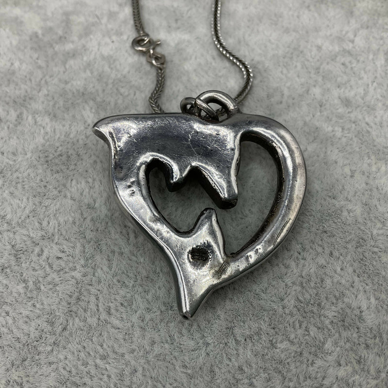 Sterling silver dolphin pendant