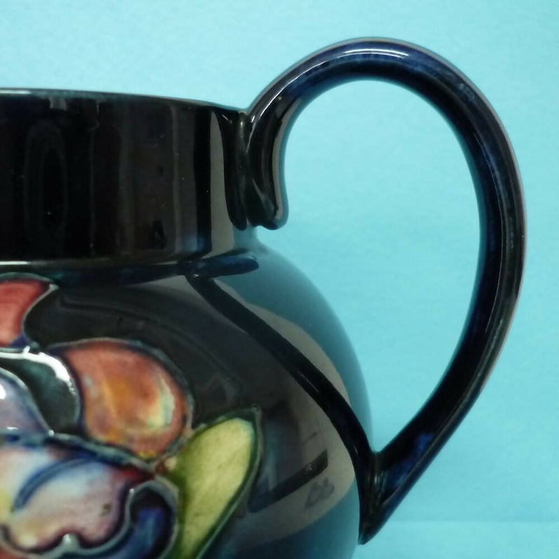 A Moorcroft (c1950's/60's) Jug in the Orchid Pattern by Walter Moorcroft