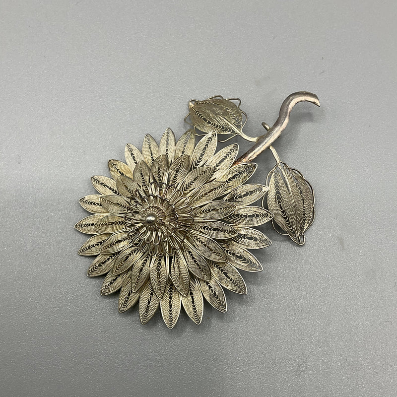 Silver filigree brooch