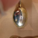 Set of enamelled silver gilt coffee spoons