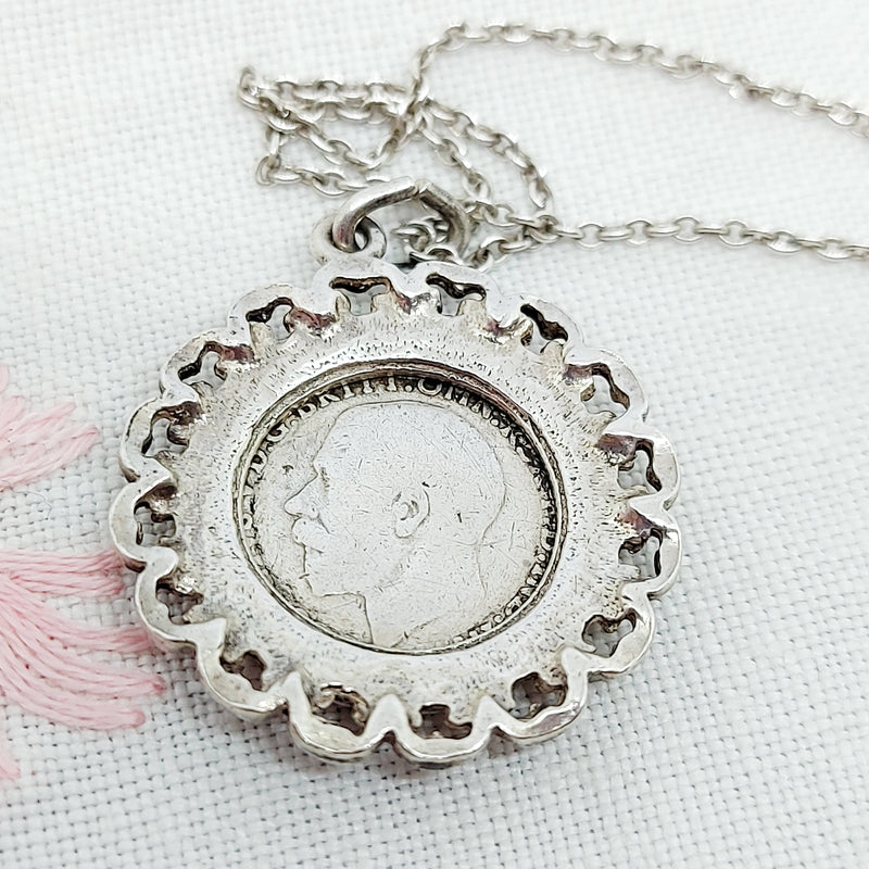 A 1916 Silver 3d Coin in a Silver Mount and Chain