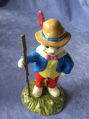 Royal Doulton Rupert The Bear figure Royal Doulton Algy Pug figure Doulton Looking like Robin Hood figure