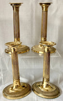Early 19th Century Set of Four Gilded Old Sheffield Plate Candlesticks.