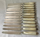 Georgian, George III, silver and mother of pearl dessert knives and forks for twelve, circa 1810.