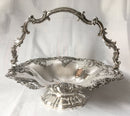 A striking late Georgian Old Sheffield Plate basket with applied fruiting vine decoration, circa 1830.