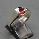 Jake: Silver and gold trillion cut garnet set ring