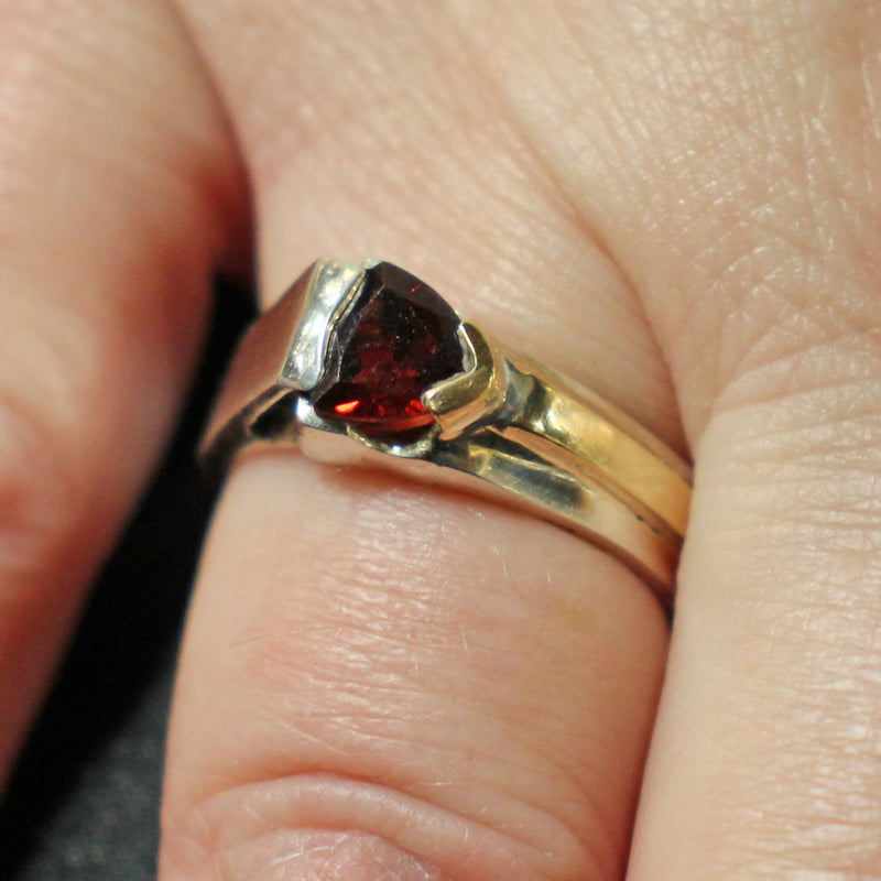 Jake: Silver and gold trillion cut garnet set ring