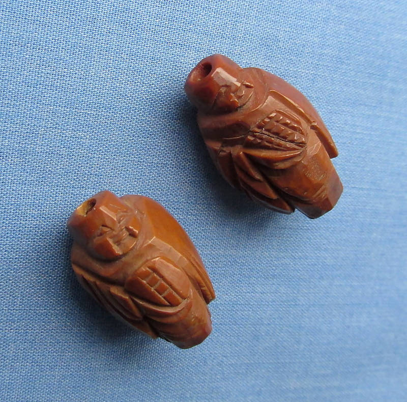 Two Figural Carved Nut Beads Plus Three Vegetable Ivory Beads