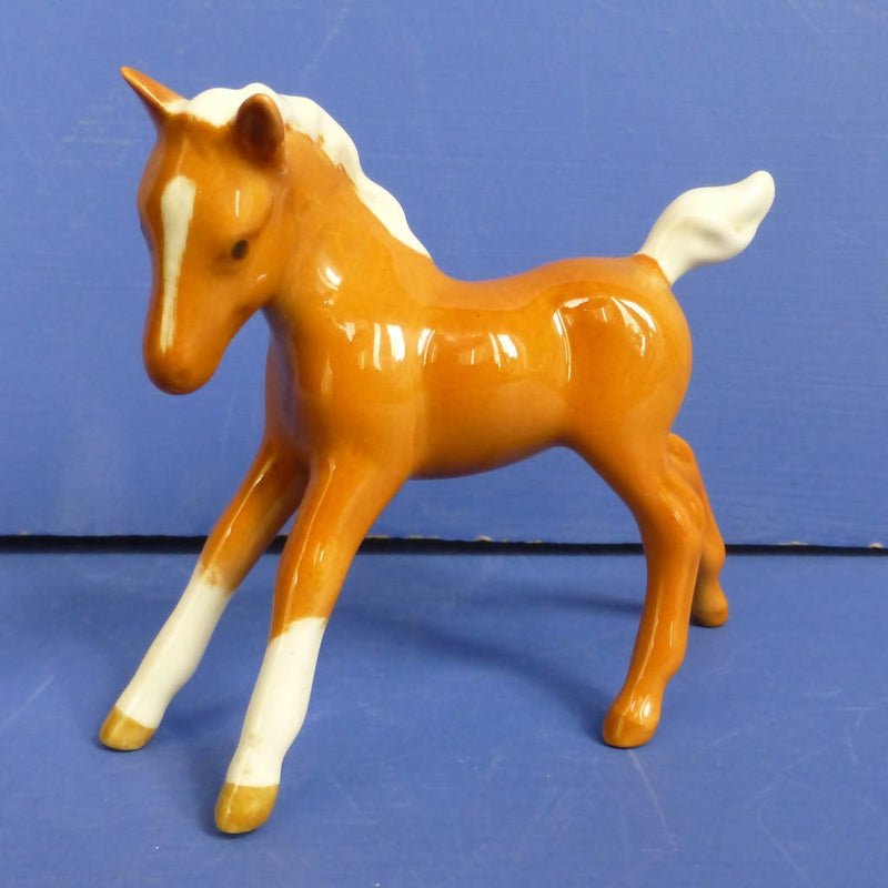 Beswick Palomino Foal (Small, Stretched, Facing Left) Model No 997