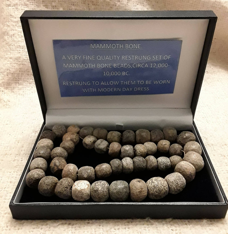 A Restrung Set Of Mammoth Bone Beads.