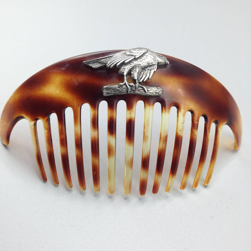 Large 1950's faux tortoiseshell hair comb with family crest