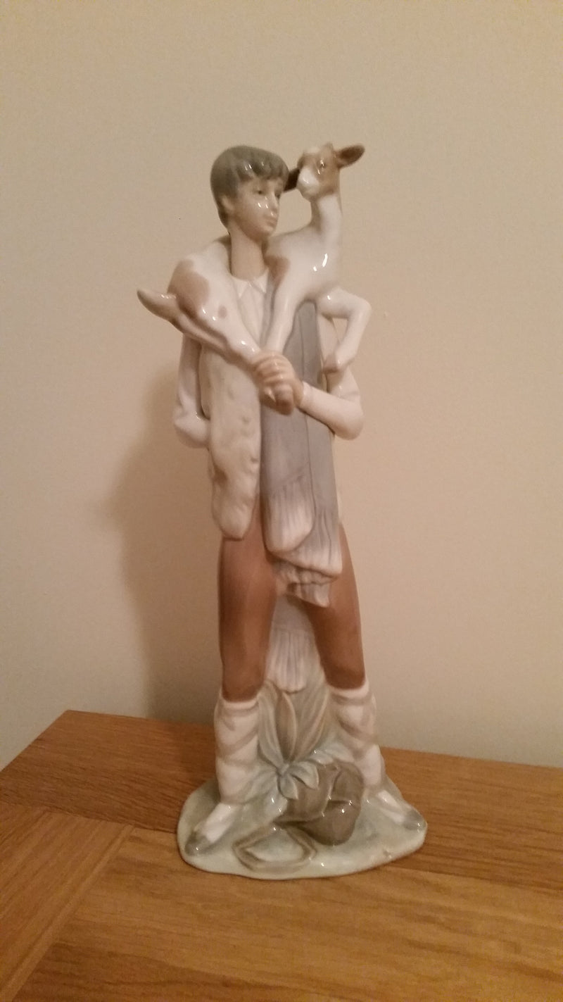 Lladro boy with a goat, ref number 4506